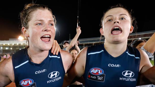 Bri Davey sings the team song after the game. Picture: Getty Images