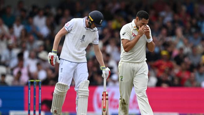 Scott Boland (R) had a forgettable day as he went wicketless in the narrow loss for Australia. Picture: AFP