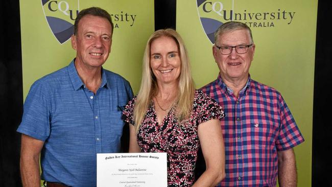 NURSING PRIZE: CQUni Nursing student Margaret Neill-Ballantine receives a bursary from Iwasaki Foundation Bursary Chairman Chris Kennard (right) and Foundation Committee Member Bob Pleash (left). Picture: Contributed