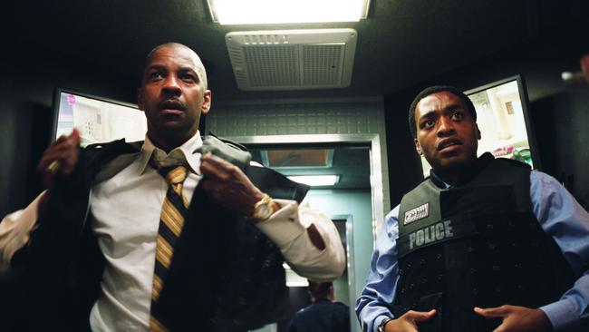 Denzel Washington with Chiwetel Ejiofor in a scene from <i>Inside Man</i>, Saturday, 11.15pm on Seven.