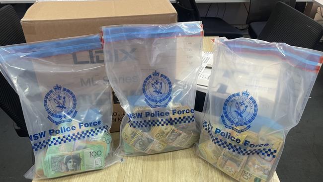 Police seized cash during an investigation into alleged drug supply across the state by an Organised Criminal Network. Picture: NSW Police