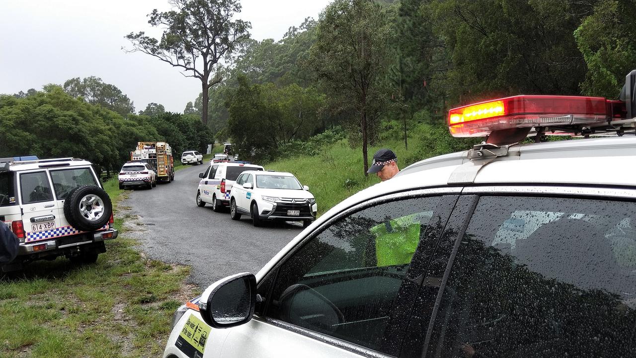 Emergency services at the scene of the landslip. Picture: Jerad Williams.