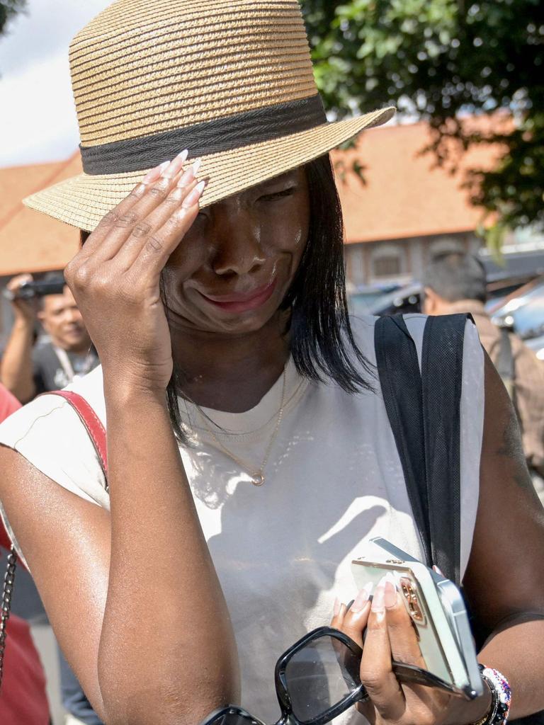 Troy Smith’s wife Tracy Ijusa, 31, visits him at Bali Police HQ in Denpasar. Picture: SONNY TUMBELAKA / AFP