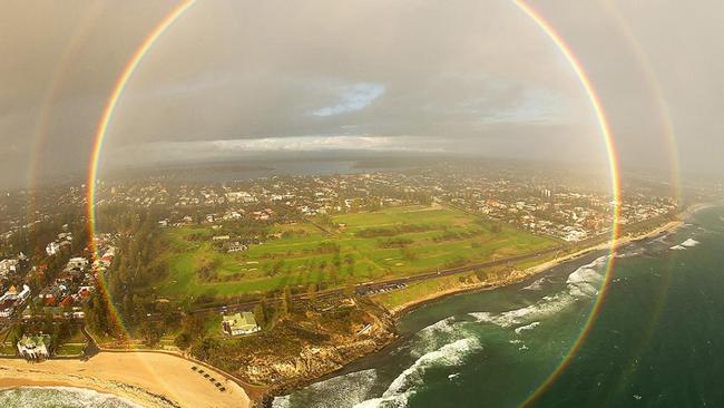 While in a helicopter with the sunset behind him and a rain shower ahead, this photographer was able to capture a full-circle rainbow over Cottesloe Beach in Western Australia. Pictured Colin Leonhardt/