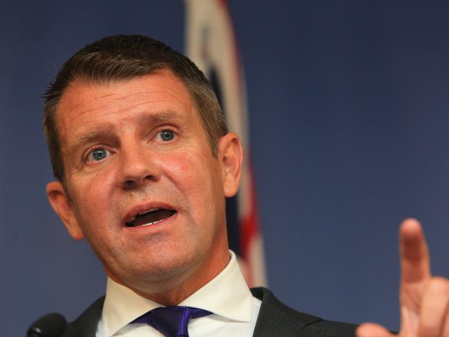 Premier Mike Baird announces his retirement at a press conference at his Martin Place office yesterday. Picture: Mark Evans