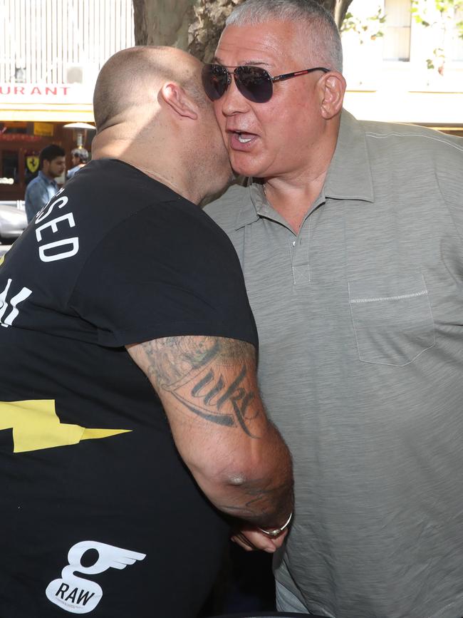 Mick Gatto greets Angelo Venditti. Picture: Alex Coppel