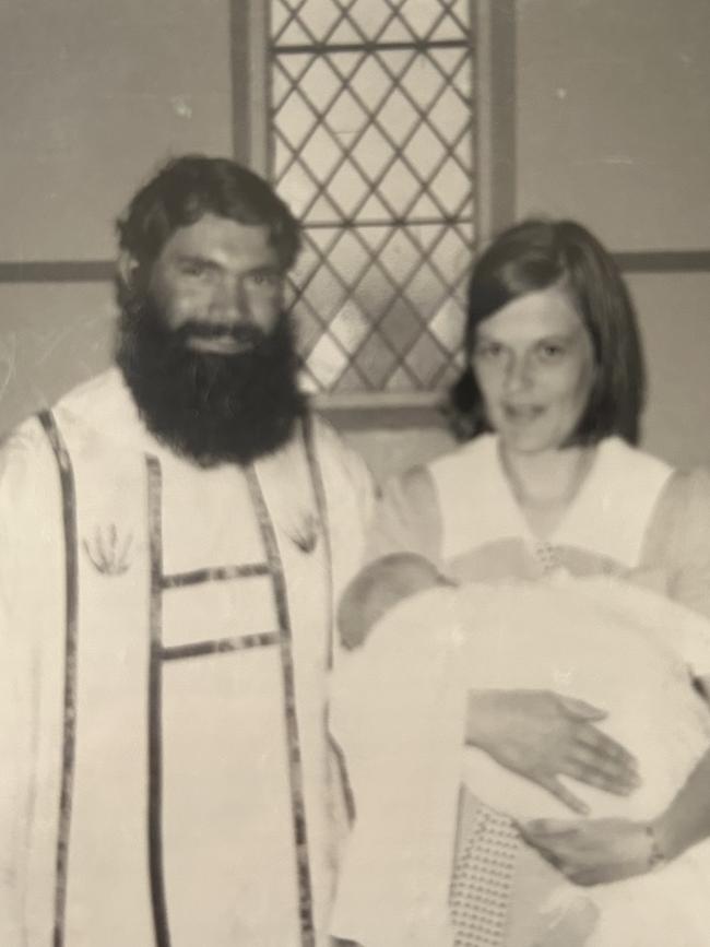 Dodson in the priesthood with family friend Marilyn Wombwell and her baby daughter Tina. Picture: Supplied