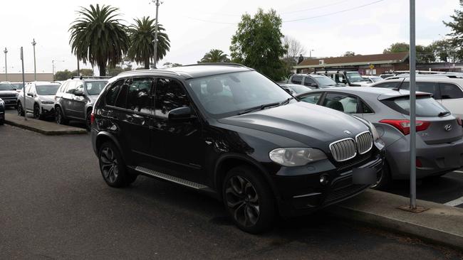 This BMW drove onto the concrete curb. Picture: Brad Fleet