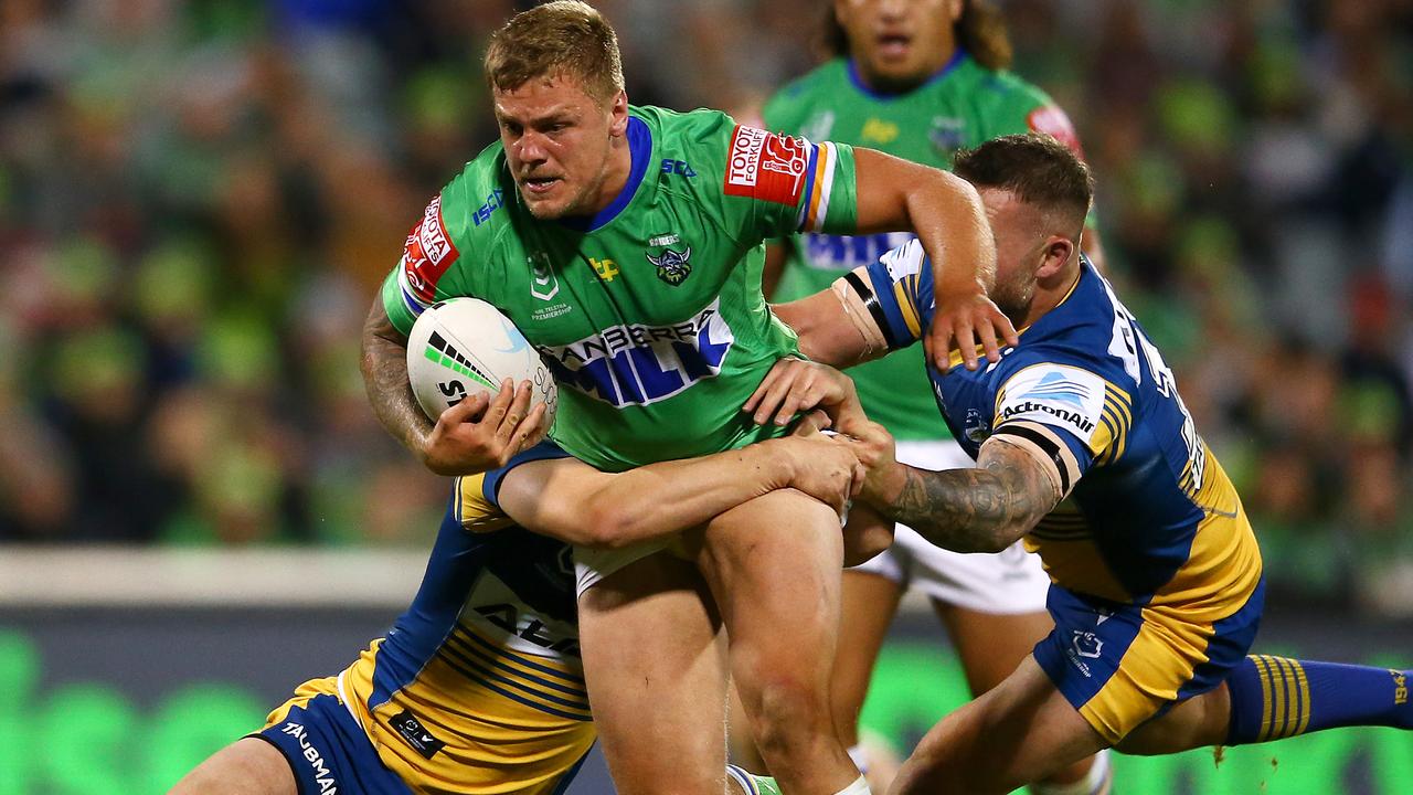 CANBERRA, AUSTRALIA - APRIL 17: Ryan Sutton of the Raiders is tackled during the round six NRL match between the Canberra Raiders and the Parramatta Eels at GIO Stadium on April 17, 2021, in Canberra, Australia. (Photo by Matt Blyth/Getty Images)