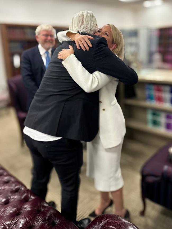 Kevin Rudd looks on as Julian Assange and Jennifer Robinson embrace. Picture: Instagram