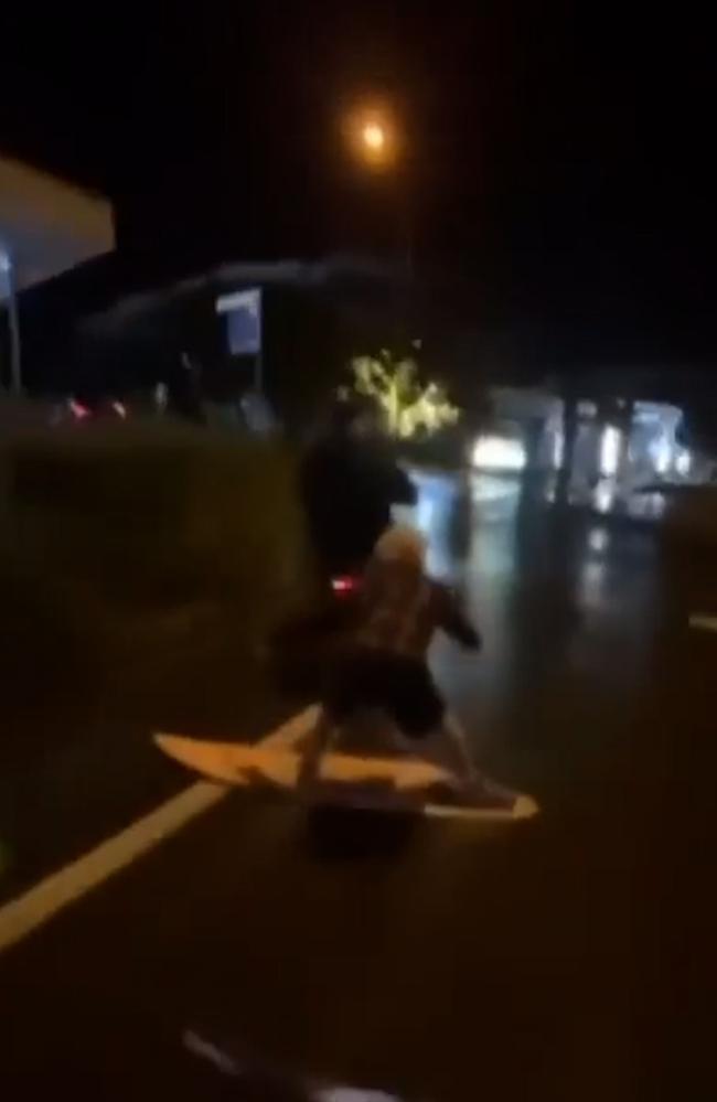 Video of boy surfing down a Sunshine Coast road, towed by bike. Picture – Instagram.