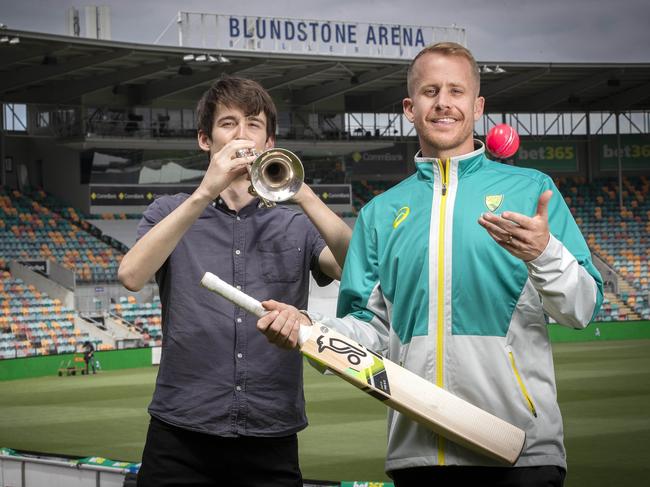 Luca Brasi lead singer Tyler Richardson, right, ahead of their performance at the Ashes, with Barmy Army trumpeter Darcy O’Malley at Blundstone Arena. Picture: Chris Kidd