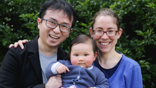 Cr Sam Ngai with his wife and one-year-old baby.