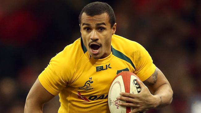 CARDIFF, WALES - NOVEMBER 30: Will Genia of Australia runs with the ball during the international match between Wales and Australia at the Millennium Stadium on November 30, 2013 in Cardiff, Wales. (Photo by David Rogers/Getty Images)