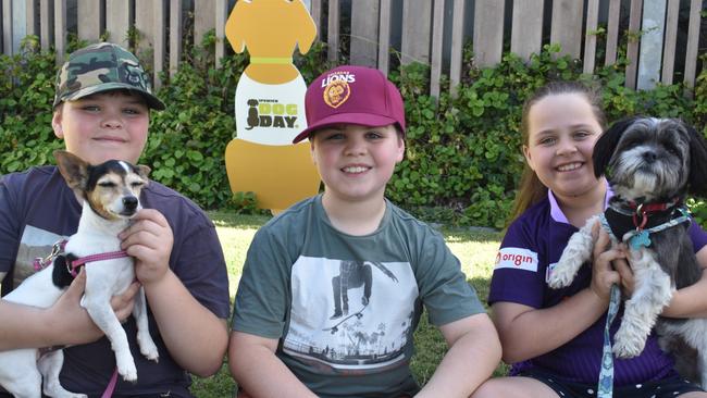 Ipswich 2023 Dog Day at Nicholas Street Precinct pictured is Ellie Cross, Mason Cross and Jackson Cross with dogâ€™s Teddy and Pennie