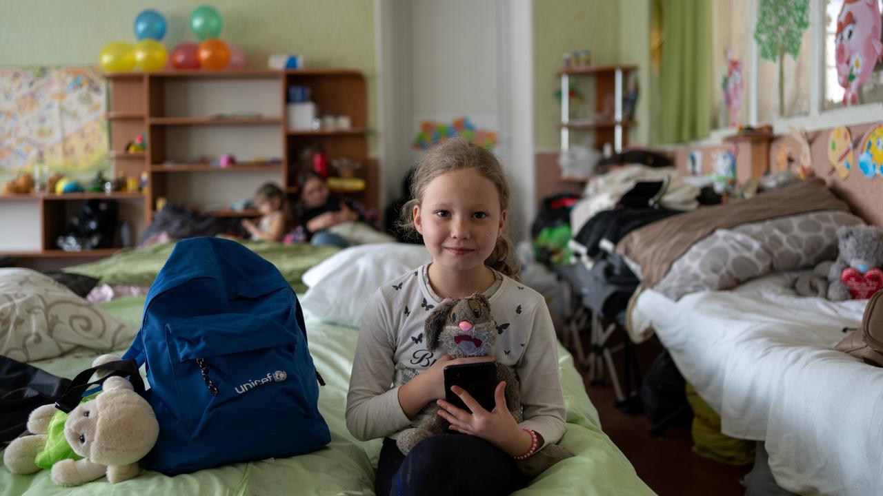 Alyona and Motya the rabbit. Picture: Oleksii Filippov/UNICEF