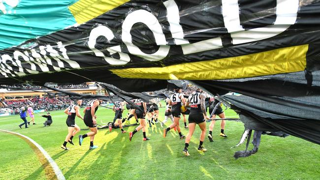 Power players run through their less-controversial Showdown banner. Picture: AAP Image/David Mariuz