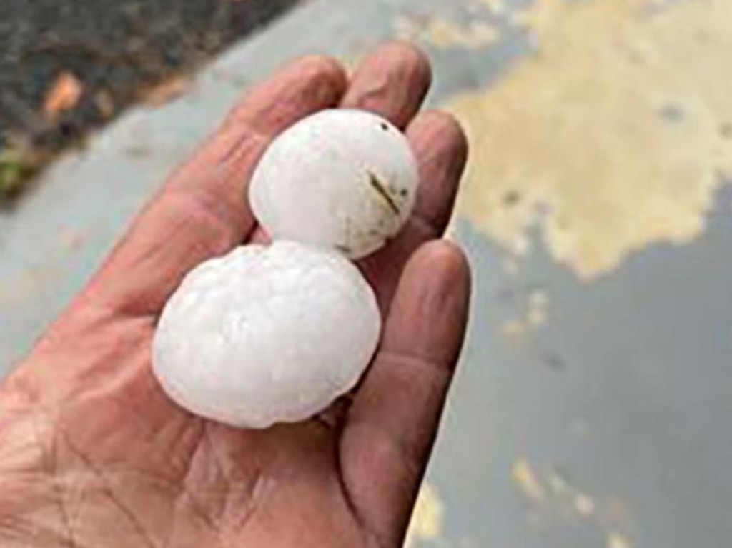 Golf ball-size hail which landed at Kooralbyn, 50kms west of the Gold Coast. Picture: Higgins Storm Chasing / Facebook