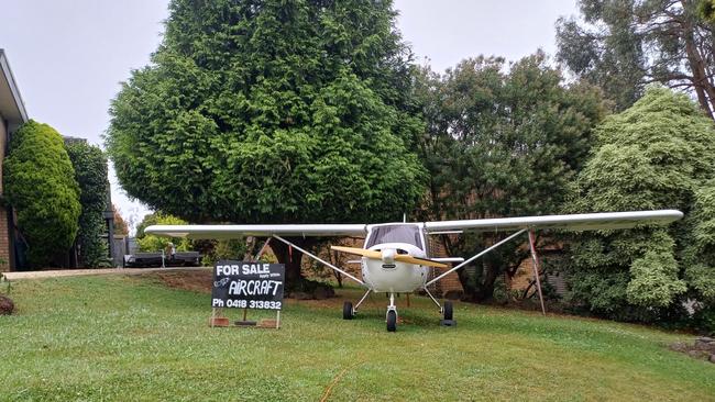 Richard Gee is selling his small plane from his Chirnside Park front lawn.