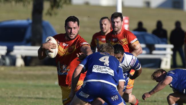 METRE EATER: Miles Fairbank busts through tackles during the major semi final against the Grafton Ghosts.