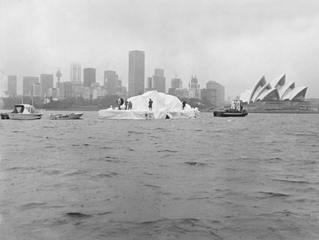 The "iceberg" being towed into Sydney Harbour ... Dick Smith's most famous April Fool's Day prank. Picture: Sydney Opera House / Facebook Courtesy: Museum of Hoaxes / Lost Sydney