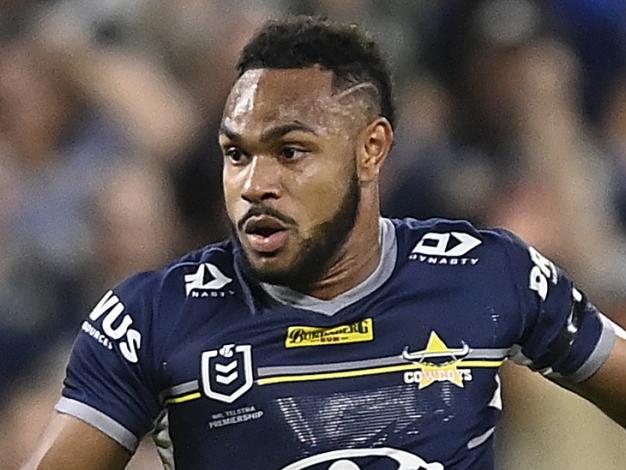 TOWNSVILLE, AUSTRALIA - AUGUST 19:  Hamiso Tabuai-Fidow of the Cowboys gets past Reece Walsh of the Warriors during the round 23 NRL match between the North Queensland Cowboys and the New Zealand Warriors at Qld Country Bank Stadium, on August 19, 2022, in Townsville, Australia. (Photo by Ian Hitchcock/Getty Images)