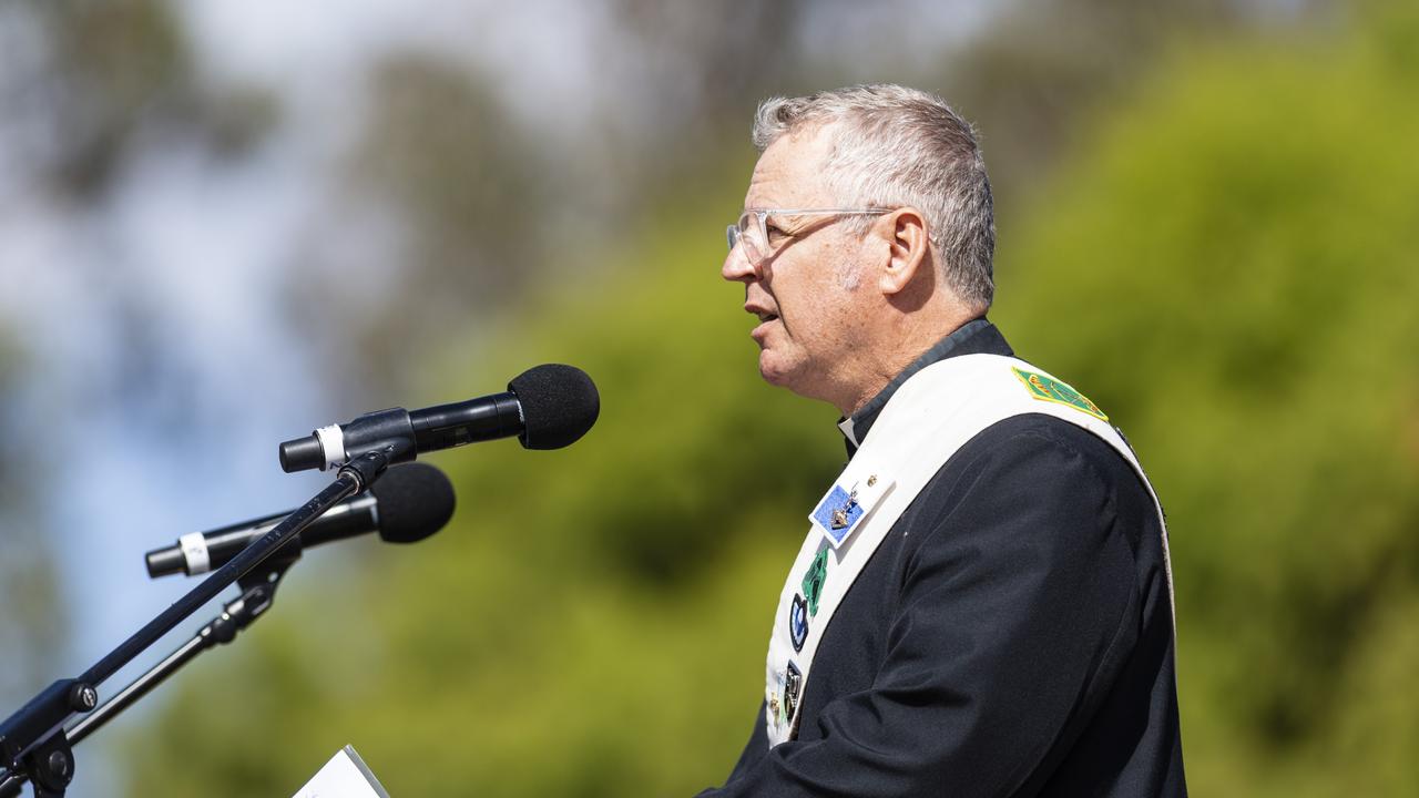 Chaplain AAVNTC Oakey Major Brenton Fry leads pray at the Anzac Day Toowoomba mid-morning Service of Remembrance at the Mothers' Memorial, Tuesday, April 25, 2023. Picture: Kevin Farmer