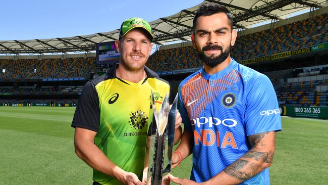 Finch and Virat Kohli ahead of the international T20 series at the Gabba. (AAP Image/Darren England)