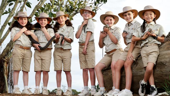 Mini zookeepers from left Evie, Katerina and Irini Ifandoudas, 8, from Greenacre, Ty Opdam, 10, from The Ponds, Jye Brooks, 12, from Bulli, Zeke Sciacca, 11, from Barden Ridge and Georgia Lee, 9, from Kenthurst that won a Sydney Zoo's competition to help collect animals from around the world that will be housed in the new zoo at Bungarribee. Picture: Jonathan Ng