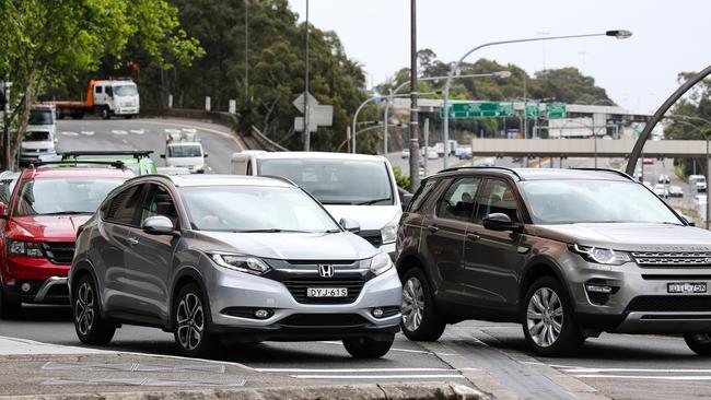 SYDNEY, AUSTRALIA - NewsWire Photos, OCTOBER 12 2021:  Higher volumes of cars are seen back on the roads today after more than 100 days of restrictions across NSW are lifted  in Sydney. Picture:  NCA NewsWire / Gaye Gerard