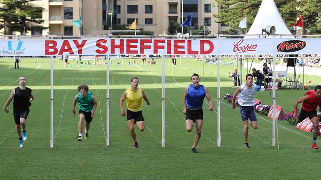 Ryan Atkins (blue) takes out last year’s men’s Bay Sheffield at Colley Reserve, Glenelg. Picture: Dylan Coker.