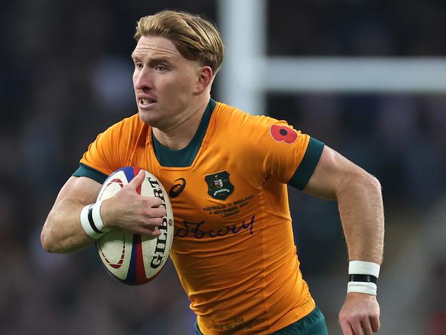 LONDON, ENGLAND - NOVEMBER 09:   Tate McDermott of Australia runs with the ball during the Autumn Nations Series 2025 match between England and Australia at Allianz Twickenham Stadium on November 09, 2024 in London, England. (Photo by David Rogers/Getty Images)