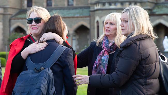 Parents, students and teaching staff at the gate after the announcement that PCW will be closing. Picture: Sarah Matray