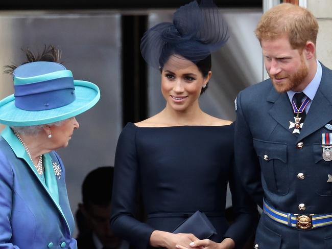 Prince Harry, Duke of Sussex and Meghan, Duchess Of Sussex, with Queen Elizabeth II at Buckingham Palace. Picture: Getty