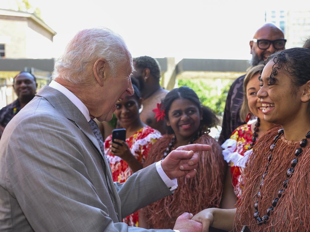 King Charles III greets a member of the Indigenous community during a visit to the National Centre for Indigenous Excellence. Picture: Getty