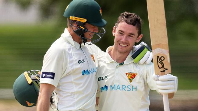 Tim Paine congratulates Jake Doran after the young gun reached his century.