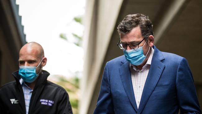 Victorian Premier Daniel Andrews walks to his daily Covid press conference in Melbourne