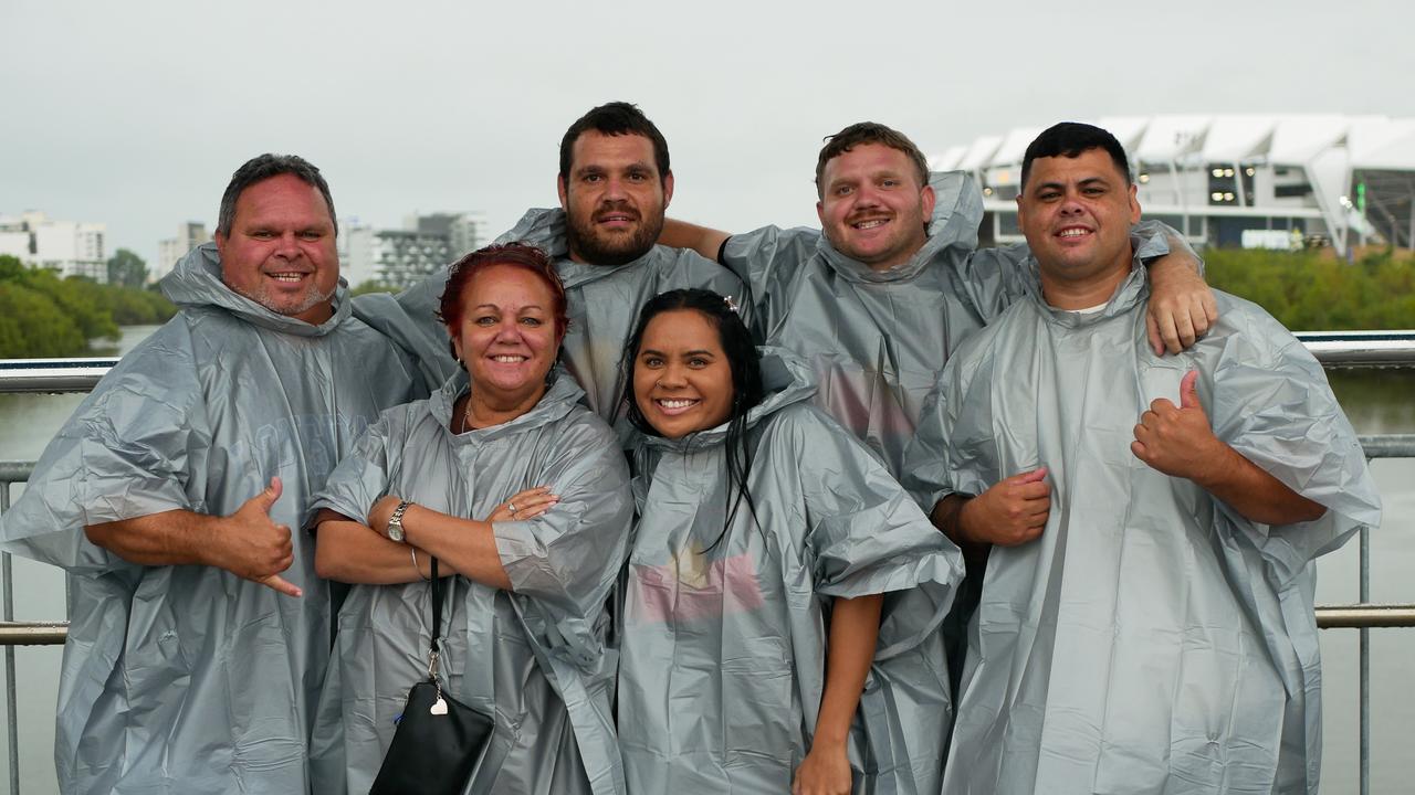 The Dunghutti crew had their ponchos ready to go on a wet night in Townsville. Picture: Blair Jackson