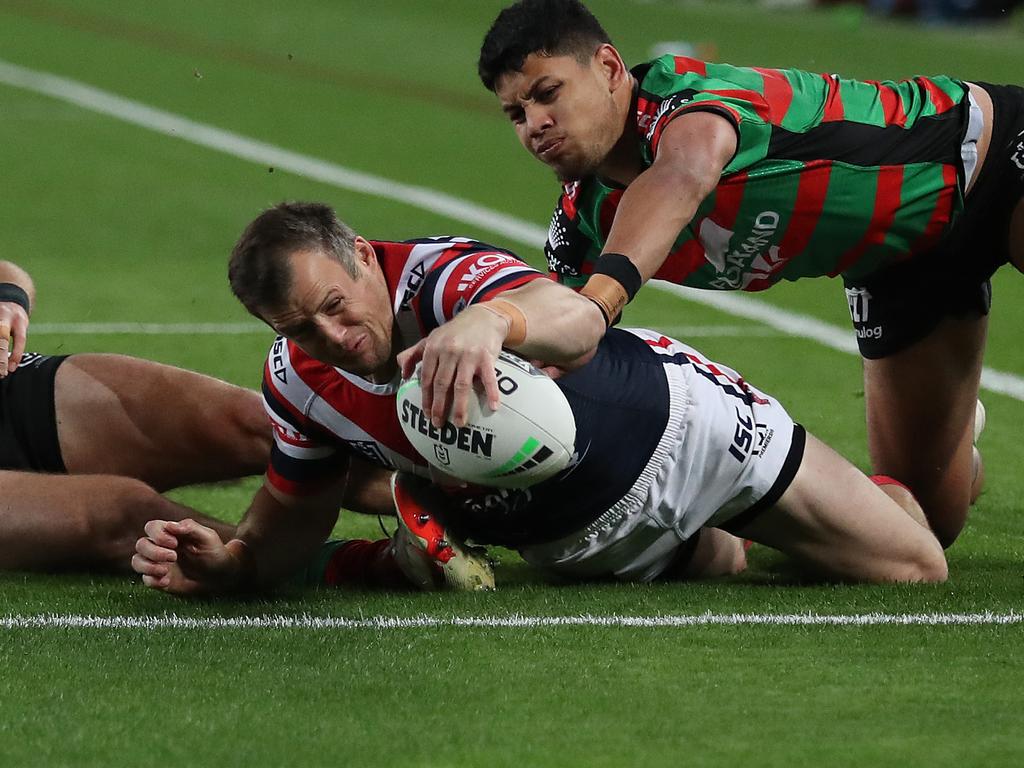 Roosters Josh Morris scores a try during the Souths v Roosters NRL match at ANZ Stadium, Homebush. Picture: Brett Costello