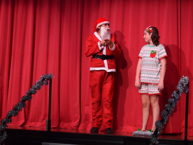 Thomas Hurley as Santa and Abbey Burton as Rosie in Rosie's Christmas Adventure.