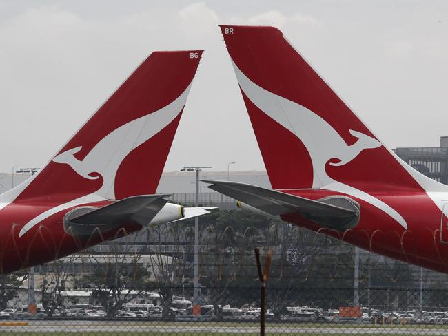 SYDNEY, AUSTRALIA - NewsWire Photos February 25, 2021: QANTAS has reported losses of around 1 billion dollars over the last year, counting the financial cost of Covid-19 on the airline. QANTAS planes are pictured at Sydney Airport today. Picture: NCA NewsWire / David Swift