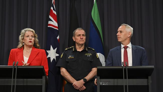 Clare O'Neil and Andrew Giles are being urged to bring in legislation to deny further releasing of foreign criminals. Pictured alongside Commissioner of the Australian Border Force (ABF) Michael Outram.