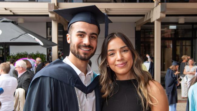 Thomas Lamprou and Zoe Karamounkzos celebrate graduation. Picture: Brad Fleet