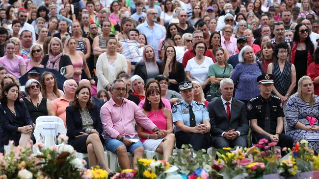 Lloyd and Suzanne Clarke, centre at front, parents to Hannah Clarke, attend a vigil to remember Hannah and her three children. Picture: Getty