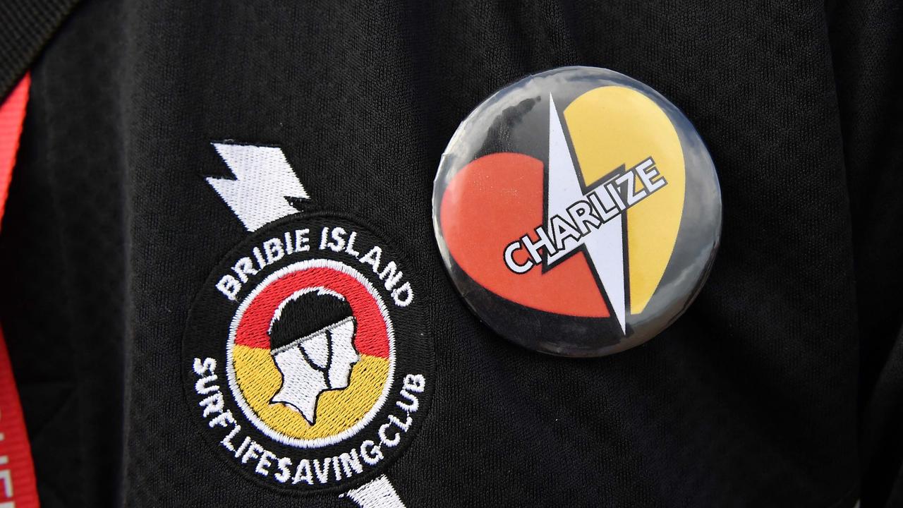 Surf Lifesavers wore badges for Charlize. Picture: Patrick Woods.