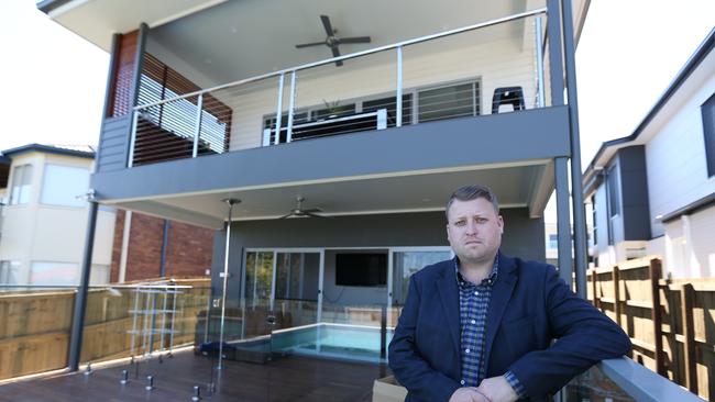 David Adams at his unfinished Q1 home at Wavell Heights. Pic Annette Dew