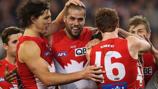 Teammates mob Lance Franklin and Gary Rohan. Picture: Phil Hillyard