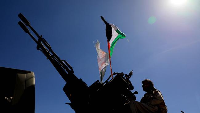 A Houthi rides an armoured vehicle during an anti-Israel and anti-US rally in Sanaa on Monday. Picture: AFP