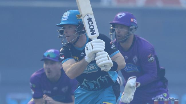 James Peirson of the Heat (centre) bats during the Big Bash League (BBL) match between the Hobart Hurricanes and the Brisbane Heat at Blundstone Arena in Hobart, Tuesday, January 29, 2019. (AAP Image/Rob Blakers) NO ARCHIVING, EDITORIAL USE ONLY, IMAGES TO BE USED FOR NEWS REPORTING PURPOSES ONLY, NO COMMERCIAL USE WHATSOEVER, NO USE IN BOOKS WITHOUT PRIOR WRITTEN CONSENT FROM AAP