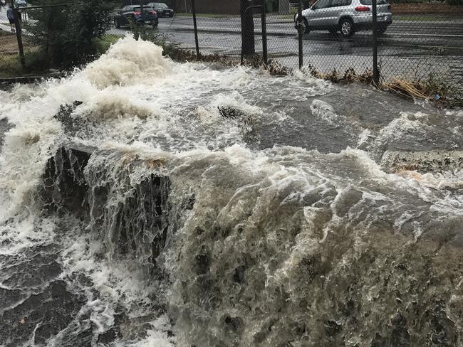 The Elster Canal flooding at the corner of Union St and Hawthorn Rd in Brighton East. Picture: Anthony Hanna